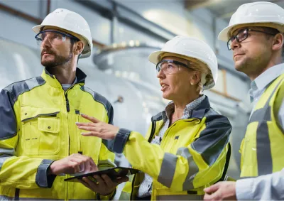 People in high visibility gear on a work site