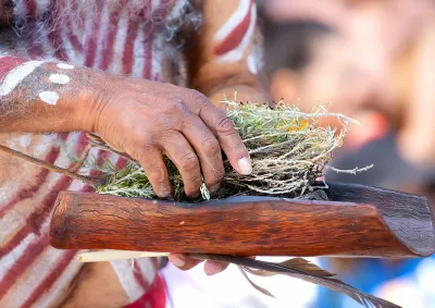 Community smoking ceremony - hands close up